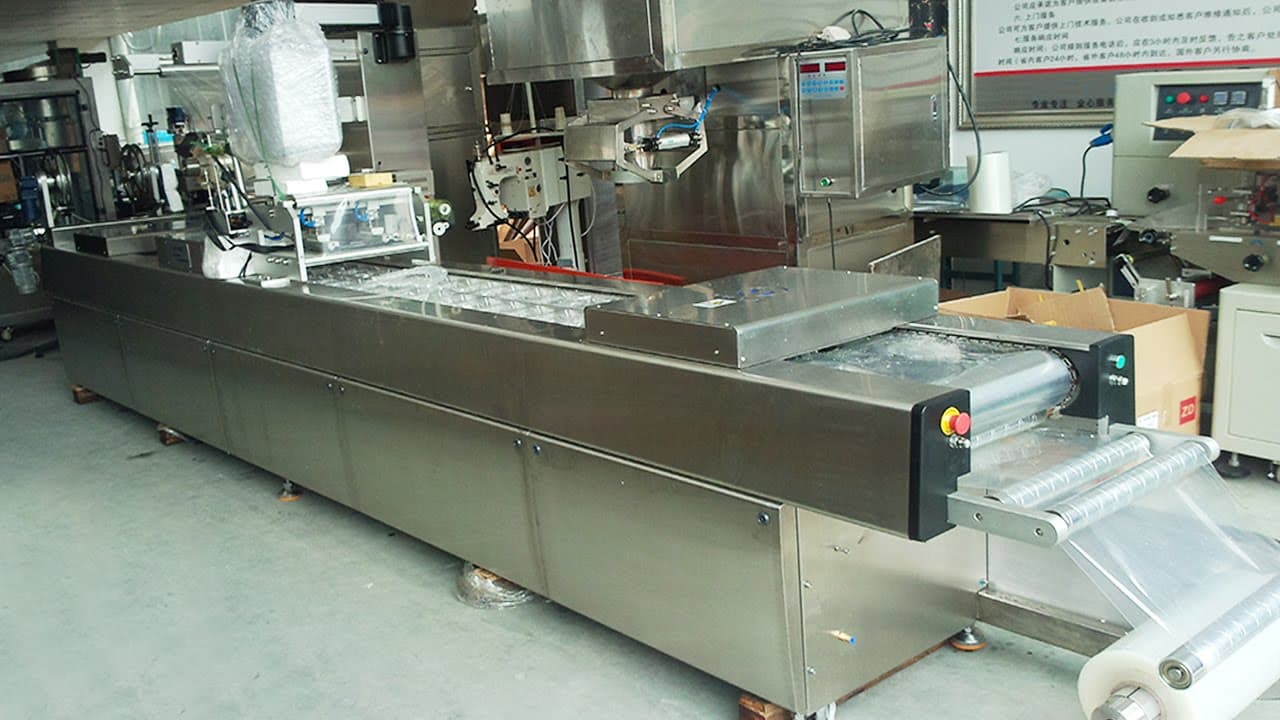 2022 Industrial Food Packaging Line – Automatic Vacuum Sealing Machine