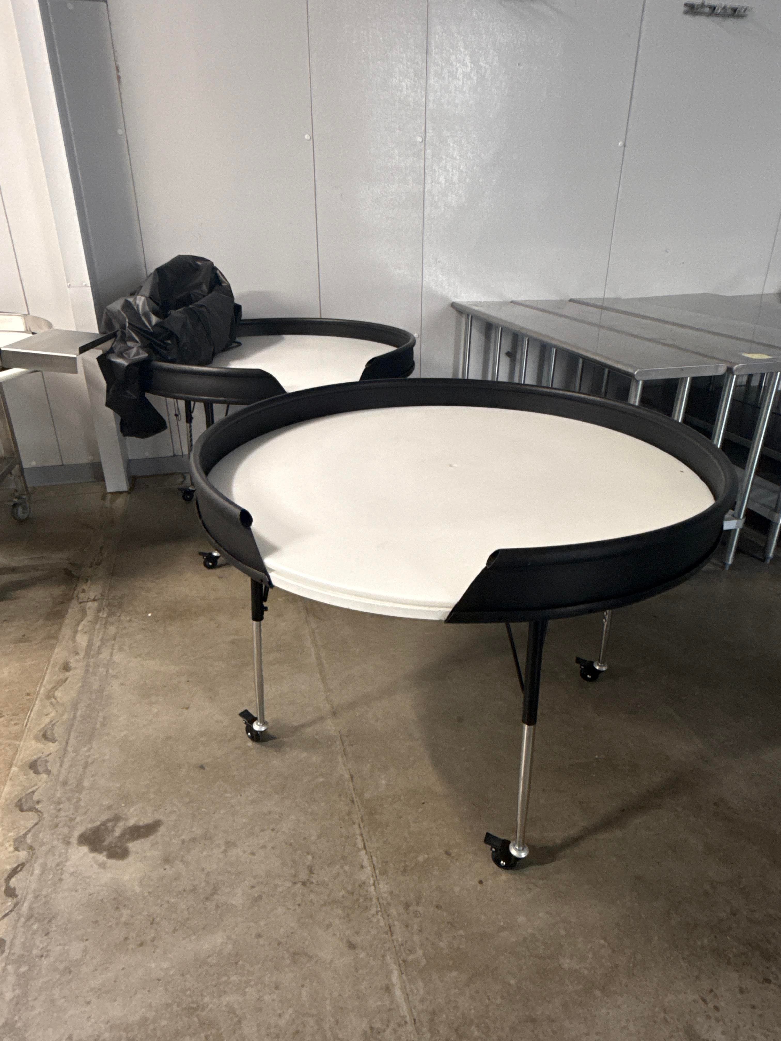 (2) W.U.P Powered Rotary Packing Turntables 120V Adjustable Height