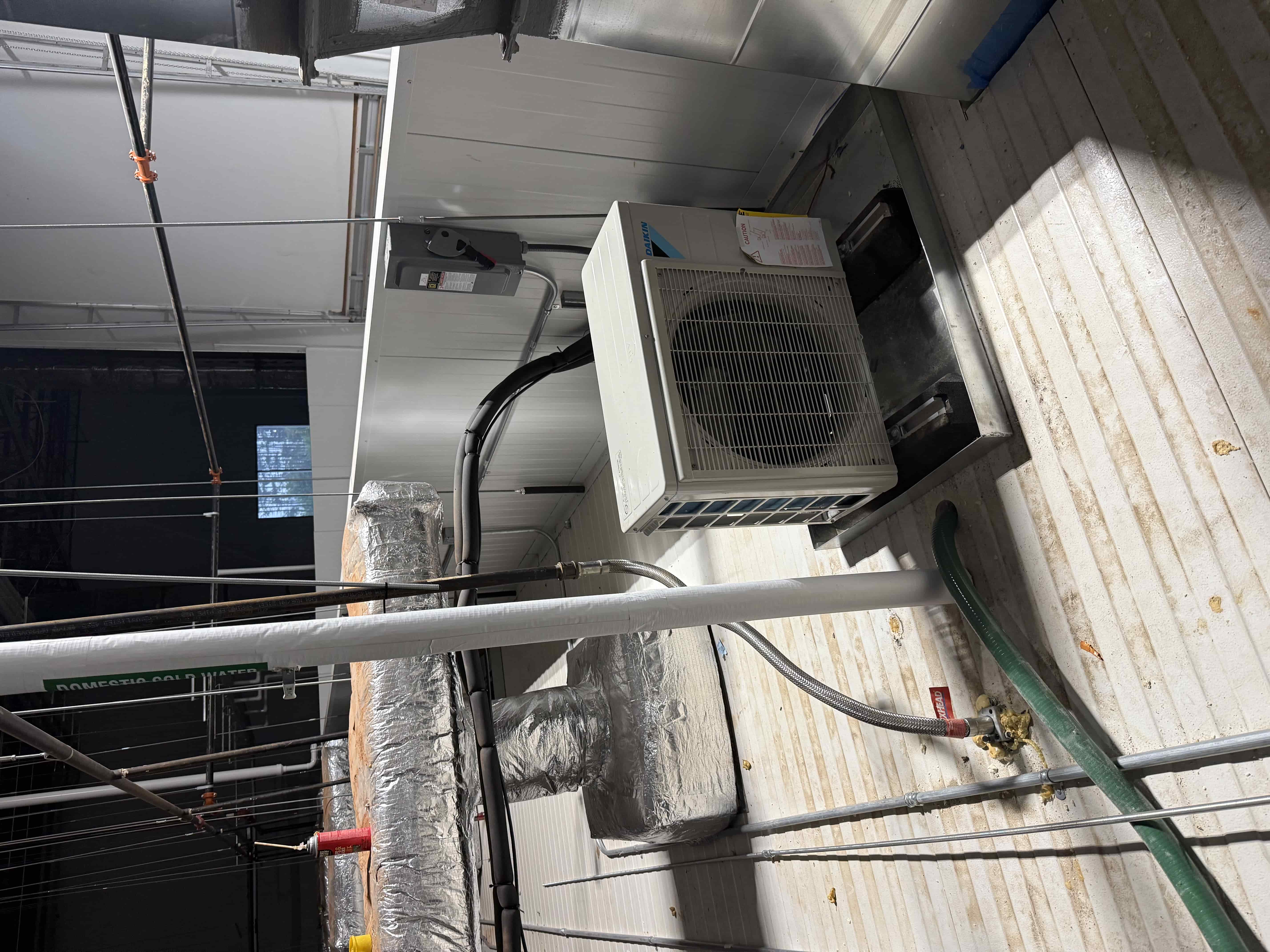 Daikin RX12RMVJU9A Heat Pump Outdoor Unit with Square D Disconnect