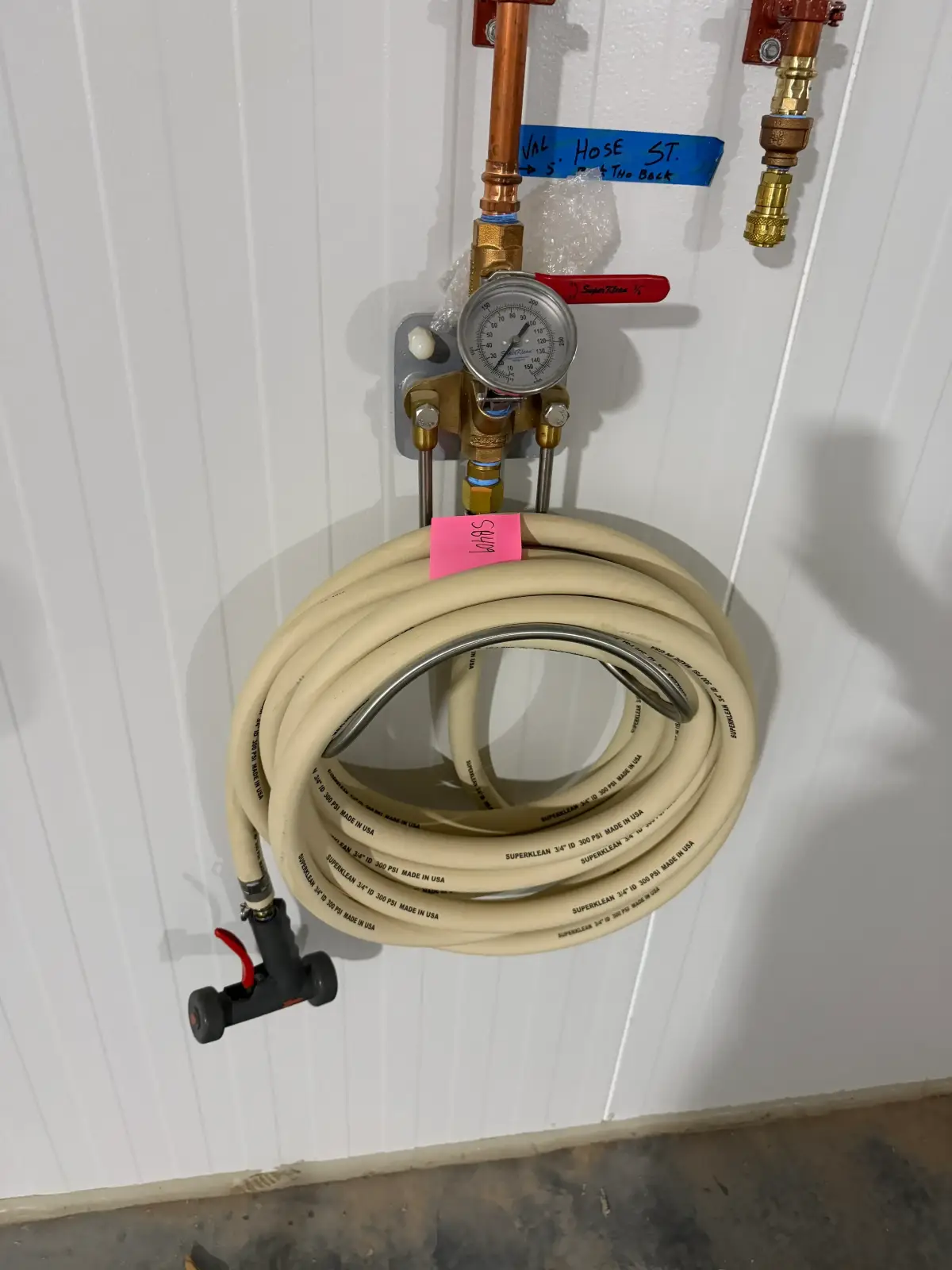 Wall-Mounted Industrial Washdown Hose Station with Pressure Gauge and Spray Nozzle