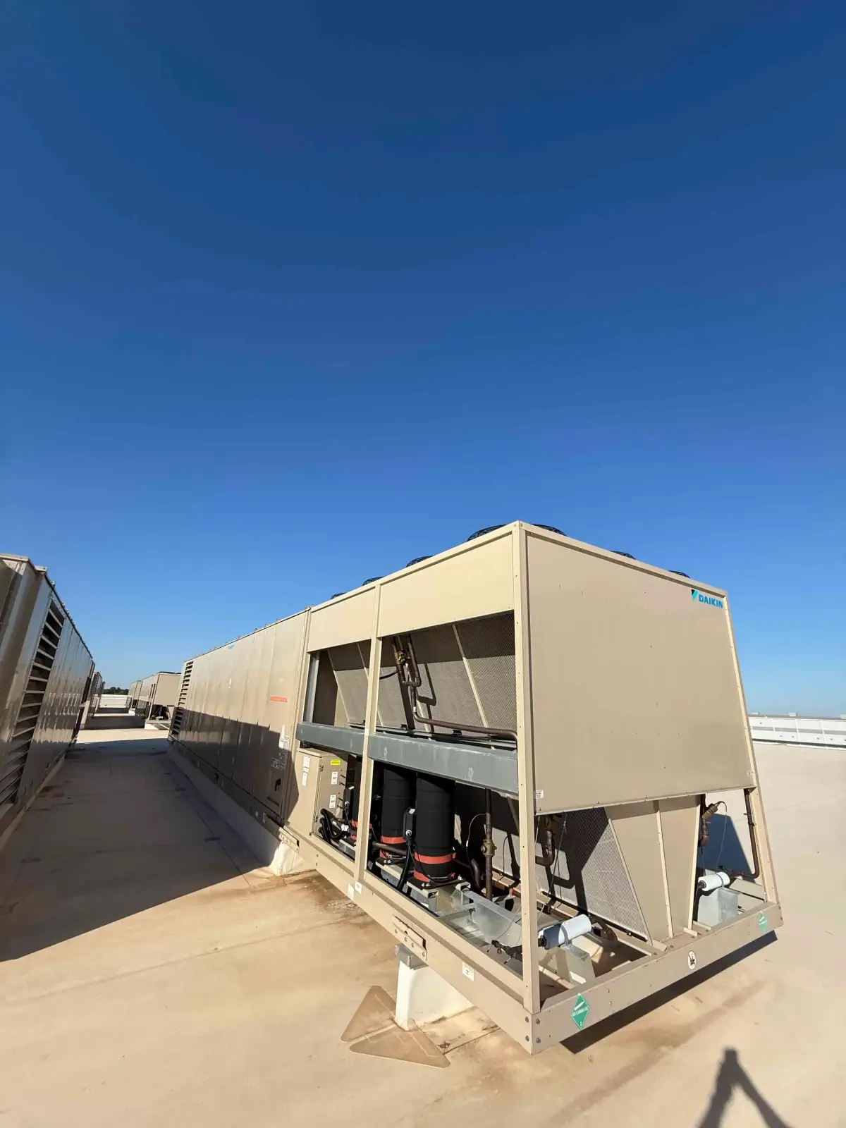 SB6006a: RTU-9 – Daikin RPS 130D Rooftop Packaged HVAC Unit, 130 Ton Nominal, ~38,000 CFM Supply Airflow, Air-Cooled DX Package