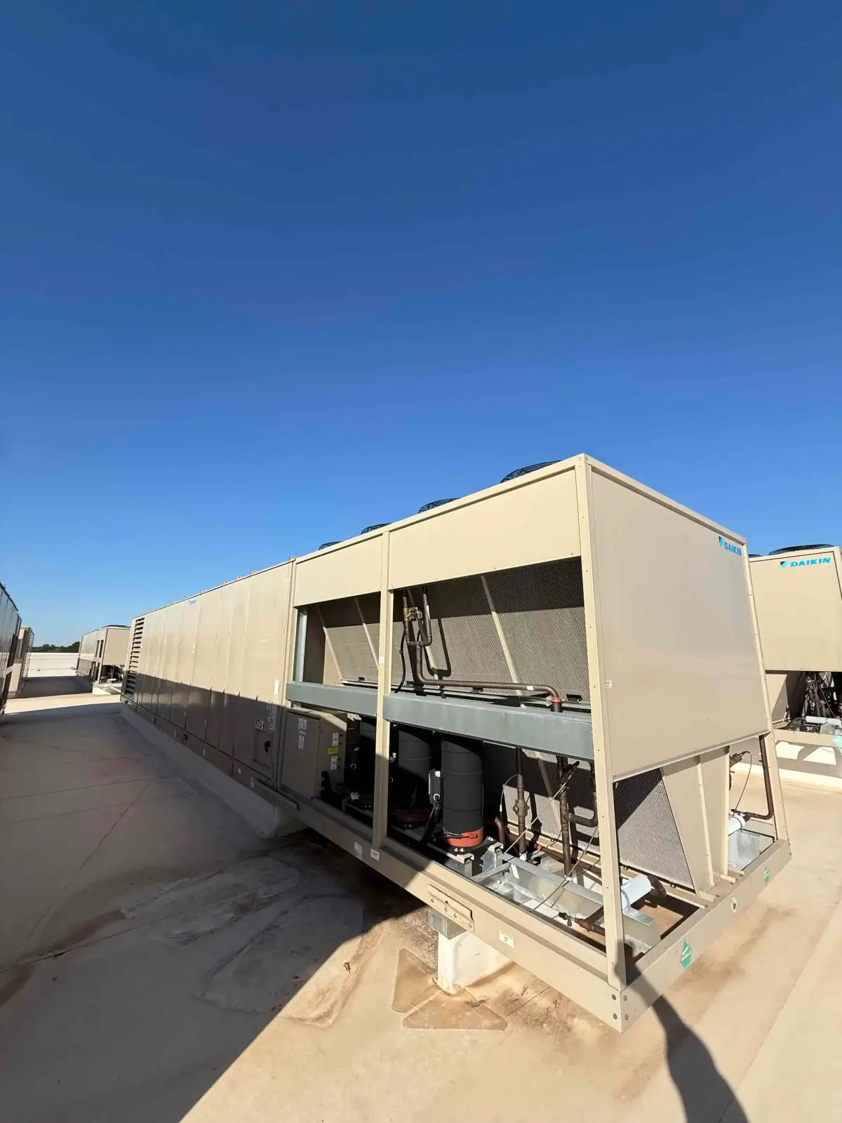 SB6006: RTU-8 – Daikin RPS 130D Rooftop Packaged HVAC Unit, 130 Ton Nominal, ~38,000 CFM Supply Airflow, Air-Cooled DX Package