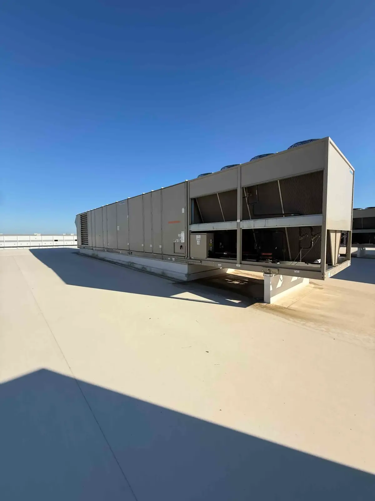 SB6003: RTU-5 – Daikin RPS 130D Rooftop Packaged HVAC Unit, 130 Ton Nominal, ~38,000 CFM Supply Airflow, Air-Cooled DX Package