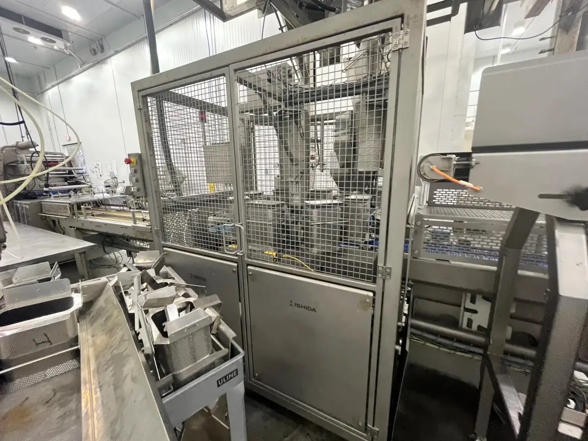 2015 Ishida Rotary Filling System (Rotary Salad Filler) – Automated Tray Filling Cell w/ Infeed & Discharge Conveyors