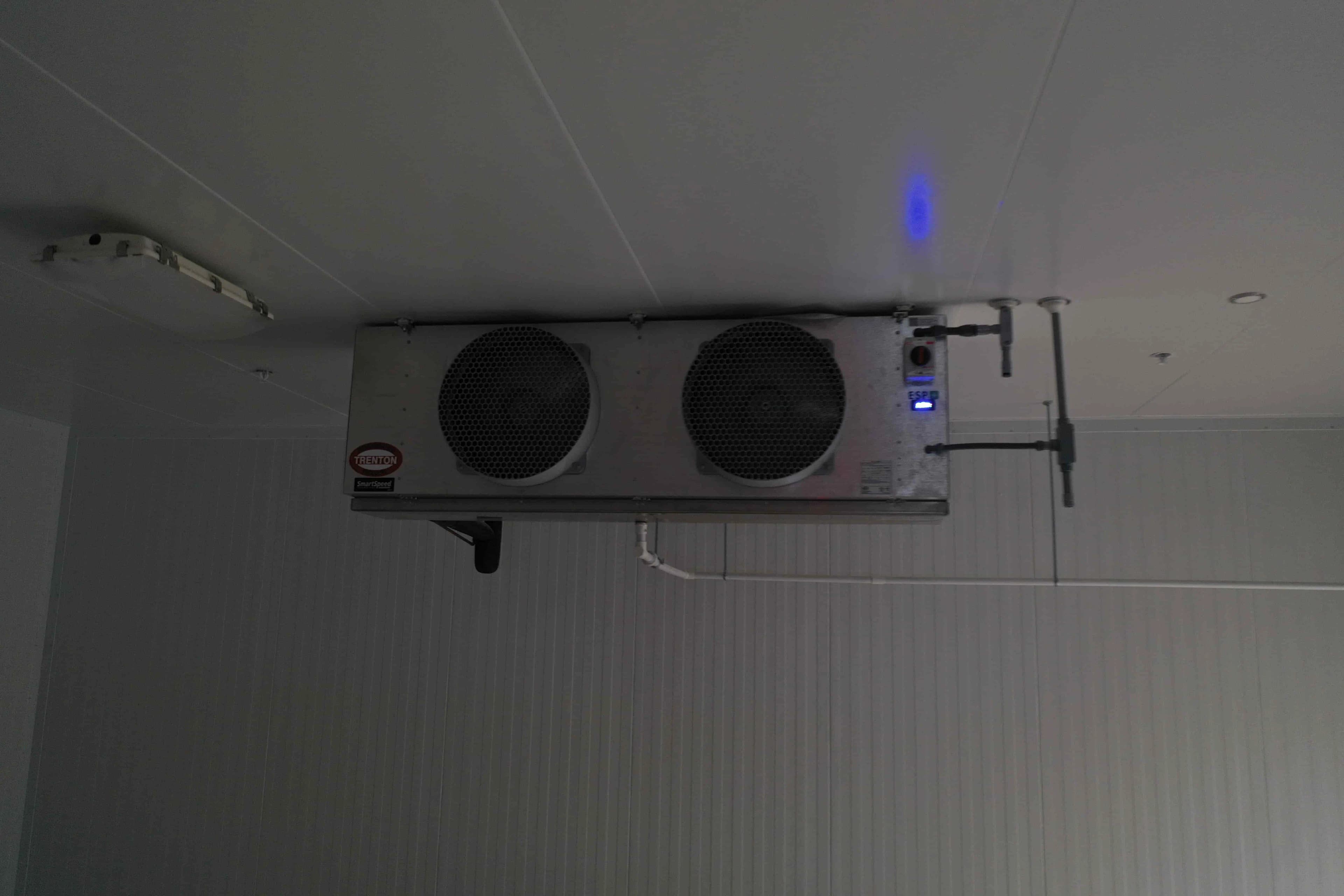 SB6014b: EVAP 9 – Trenton TMP120MA Medium-Profile Air-Defrost Evaporator, Single Fan (~3 030 CFM, 460 V 3-Phase), 40 °F Seed Flat Storage (Connected to RCU 9)