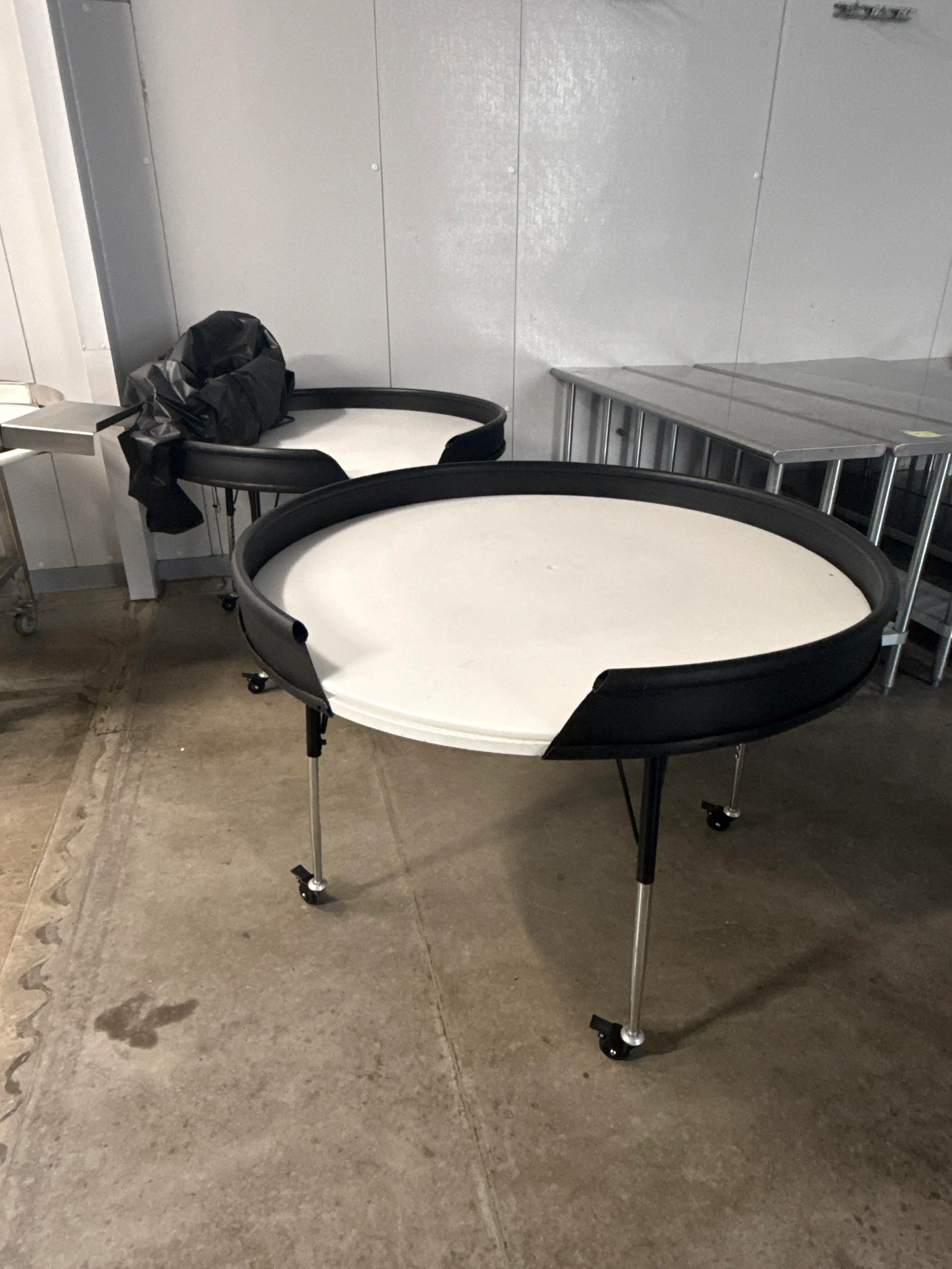 (2) W.U.P Powered Rotary Packing Turntables 120V Adjustable Height