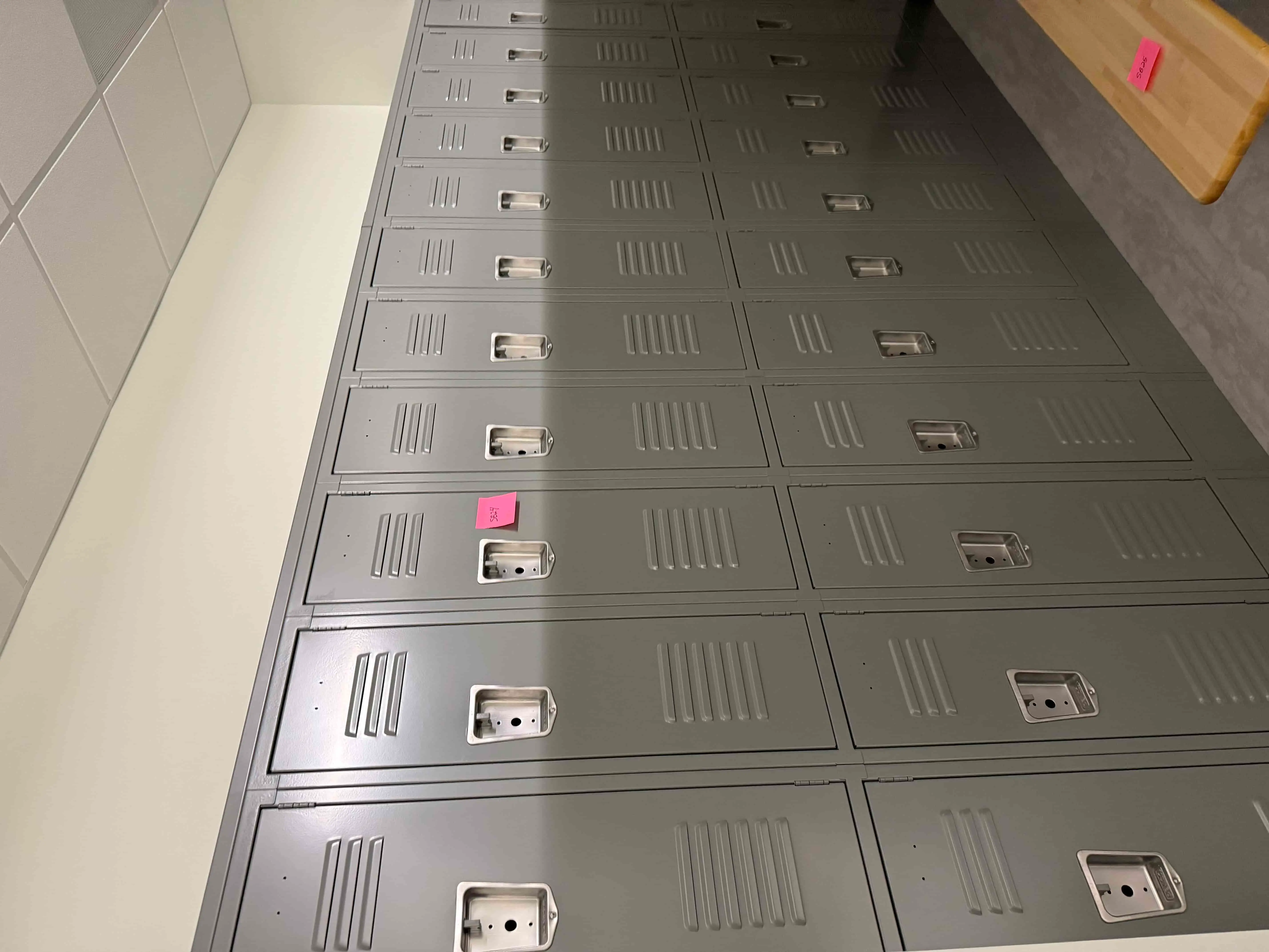 SB24: Heavy-Duty Industrial Steel Lockers – Multi-Tier Gray Locker Bank with Vented Doors and Recessed Handles