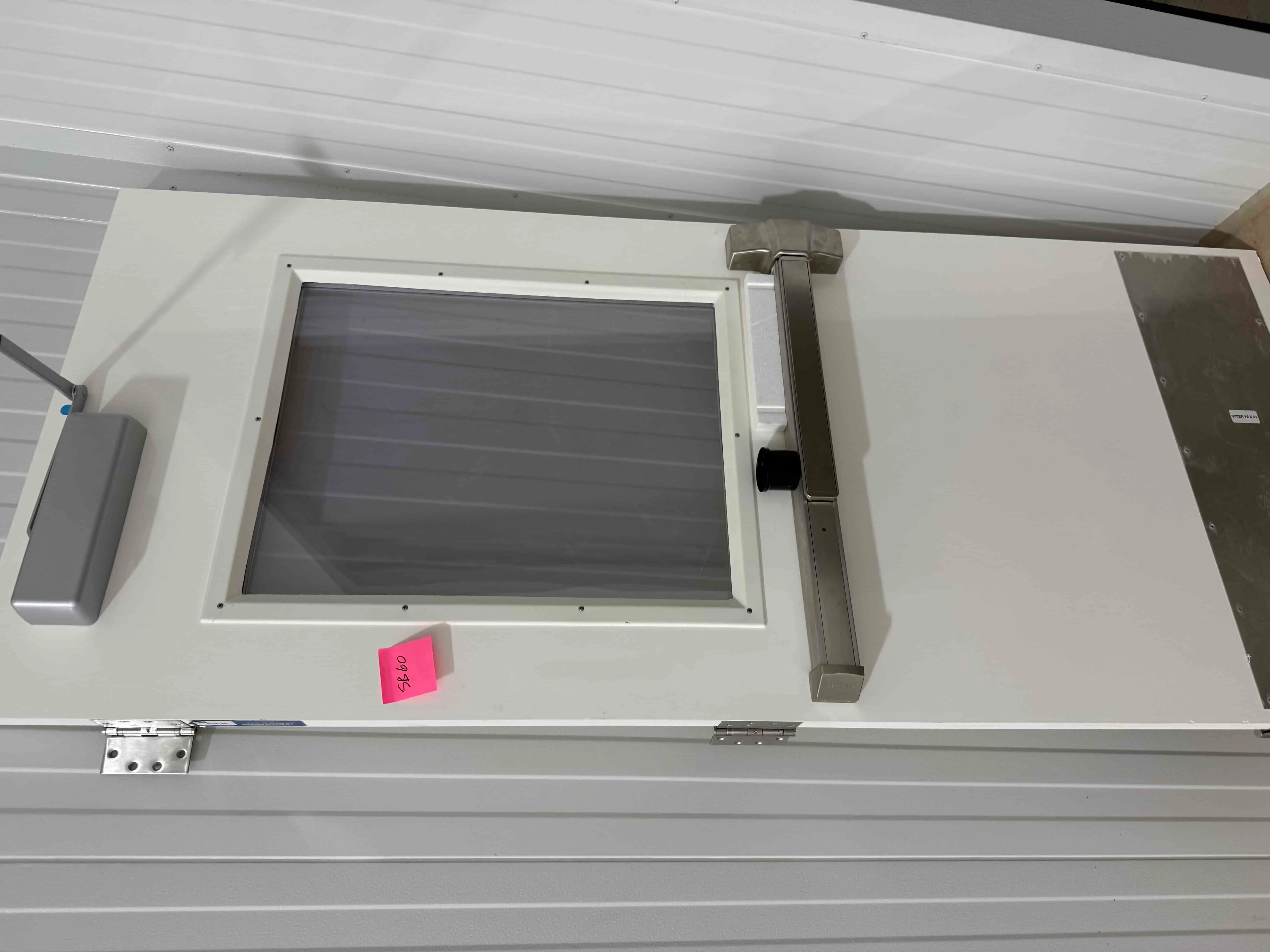 SB60: Jamison Jamocor Lamotuf Insulated Personnel Door with Vision Panel, Panic Bar Hardware and Closer – 3′ × 7′ FRP Wash-Down Door Assembly Located Near Grow Room and Electrical Room
