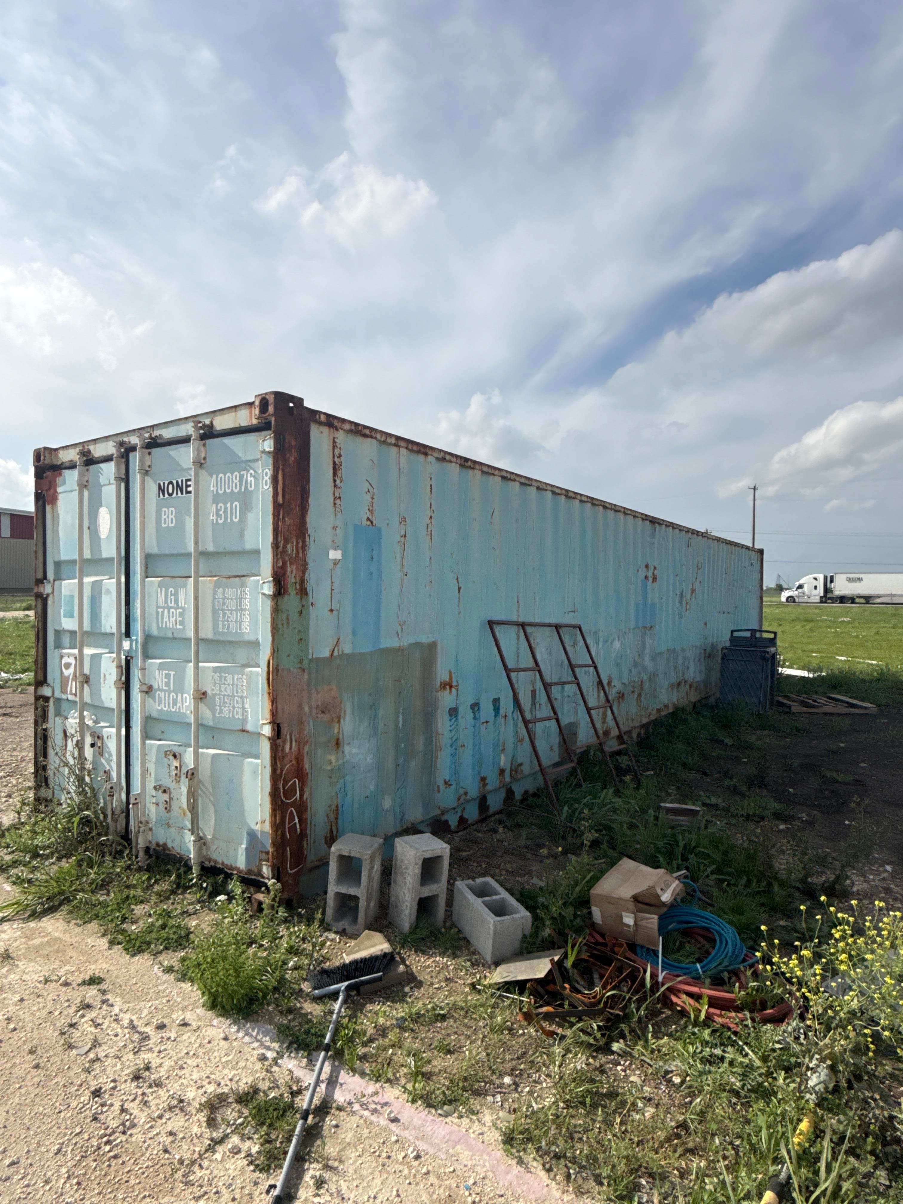 Shipping Container with Miscellaneous Contents and Scrap Materials
